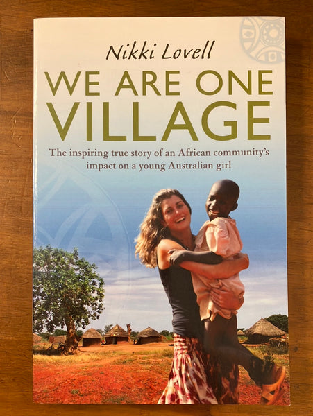 Lovell, Nikki - We Are One Village (Trade Paperback)