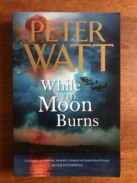 Watt, Peter - While the Moon Burns (Trade Paperback)